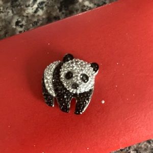 This is a panda for a necklace black an white diamonds